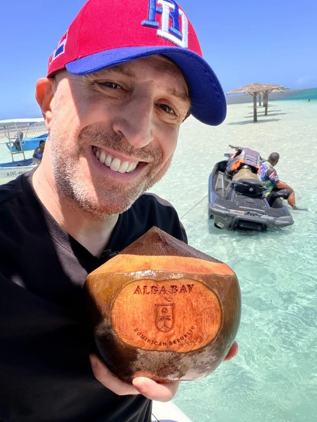 Jamie Gruber, founder of DR Inner Circle, on the beach in the Dominican Republic
